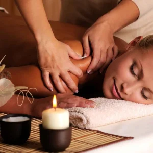 masseur-doing-massage-female-shoulder-beauty-salon